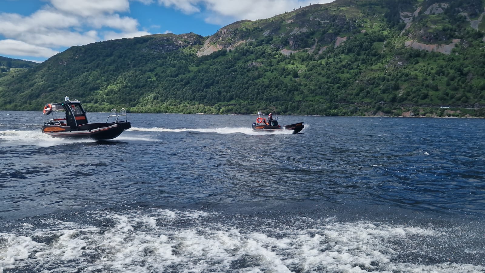 Two NESS Marine workboats on sea trial running side by side on Loch Ness