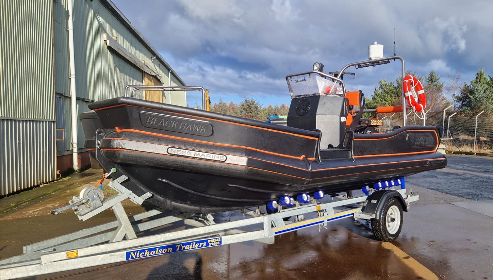 Blackhawk NESS Marine HDPE workboat on a Nicholson trailer, fitted with Garmin electronics and life ring